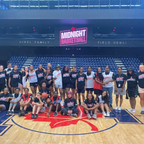 Midnight Basketball Group Photo on the court 