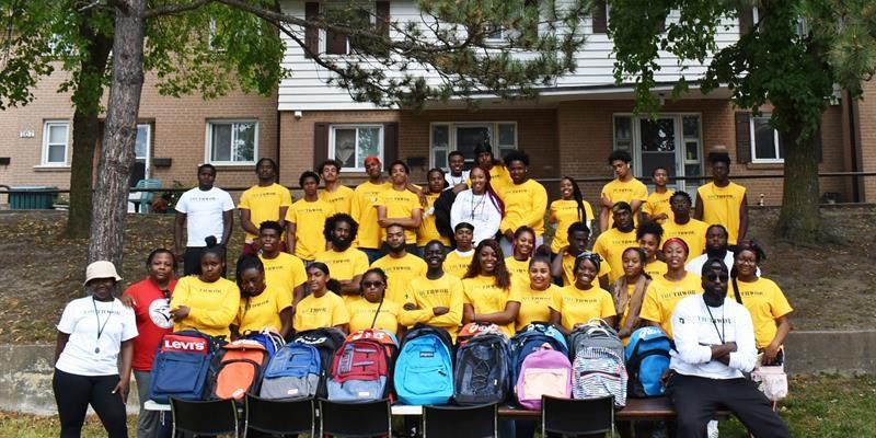 Group photo of YouthWox participants in a park