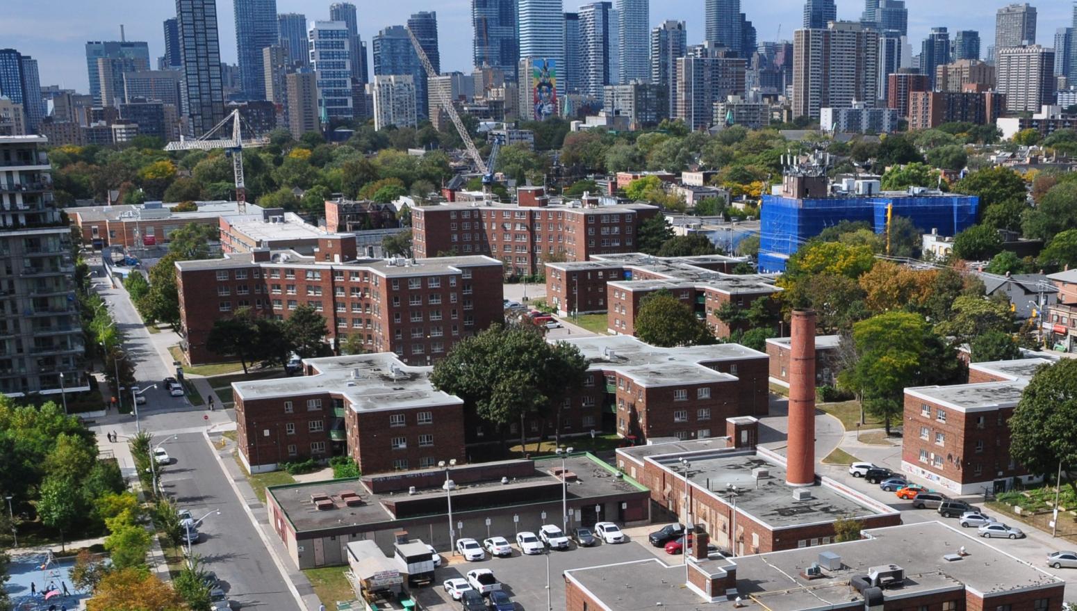 An aerial view of Regent Park from the east with more skyscrapers in the background.